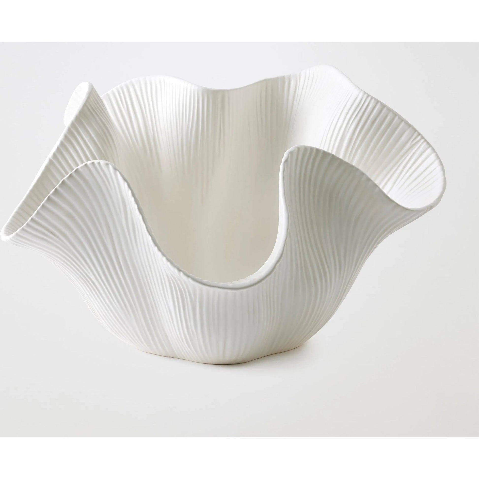 Scallop Bowl by Global Views. Made from ceramic in a modern style.