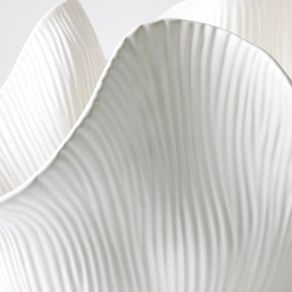 Scallop Bowl by Global Views. Made from ceramic in a modern style.