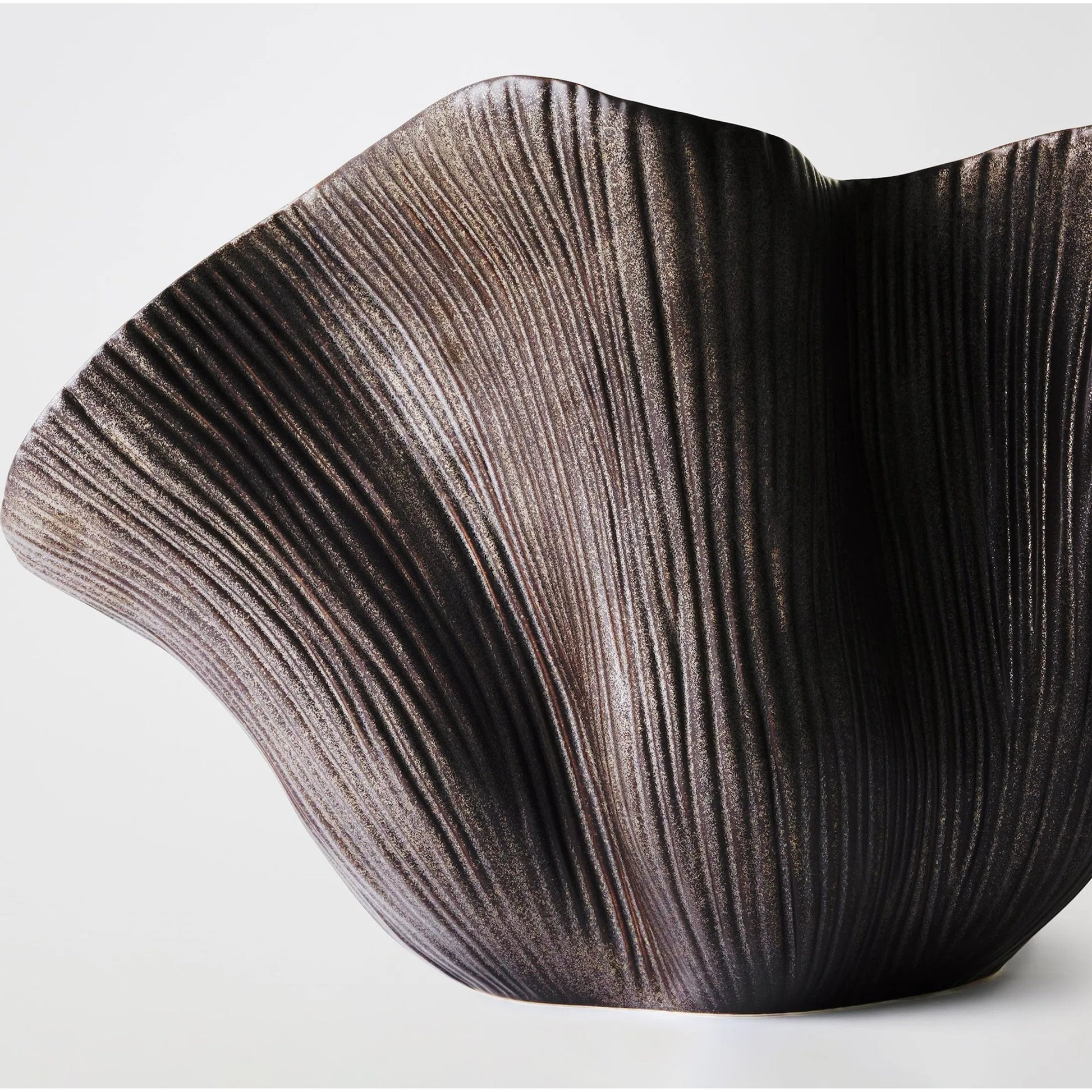 Scallop Bowl by Global Views. Made from ceramic in a modern style.