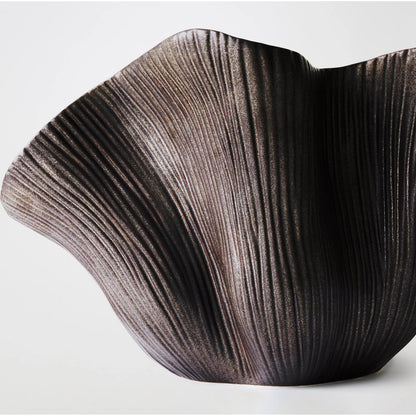 Scallop Bowl by Global Views. Made from ceramic in a modern style.