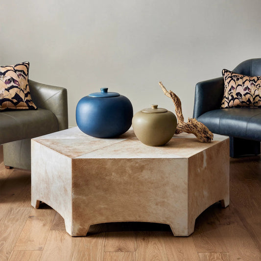 Brindle Cocktail Table by Global Views in natural. Made from cow hair-on-hide, mdf in a transitional style.