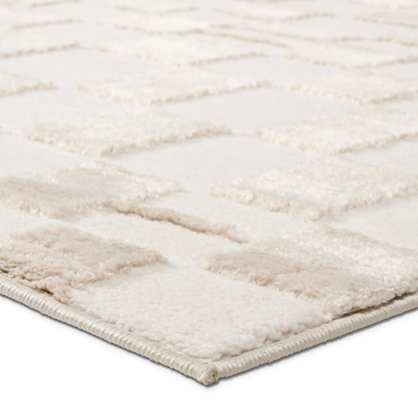 002 SI-2354609,SI-2354610,SI-2354611,SI-2354612,SI-2354613,SI-2354614 | Closeup | Jaida JID25 Rug by Jaipur Living in ivory, tan. Made from 70% polypropylene 30% polyester in a unique style.