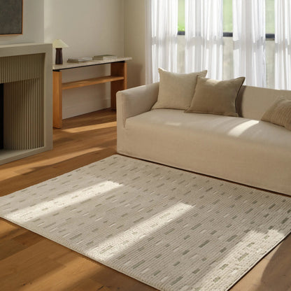 Jaida JID29 Rug by Jaipur Living in ivory, green. Made from 70% polypropylene 30% polyester in a unique style.