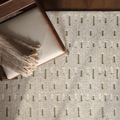 Jaida JID29 Rug by Jaipur Living in ivory, green. Made from 70% polypropylene 30% polyester in a unique style.