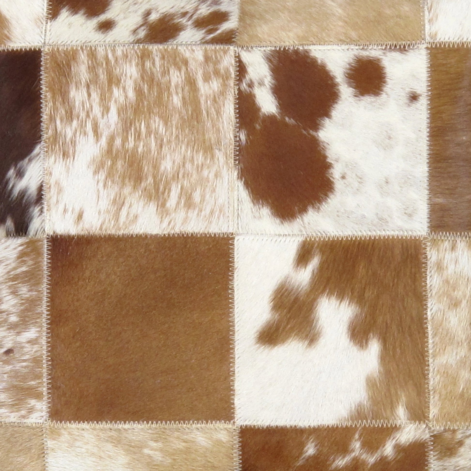 Safari Checkered Cowhide Throw Pillow by Pasargad Home. Made from cowhide in a modern style.