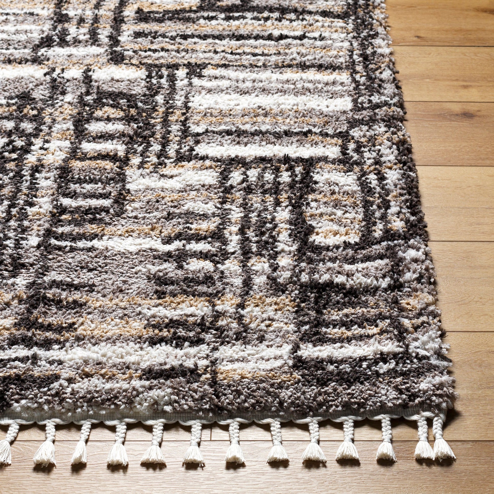 Jakarta Rug by Livabliss in gray, black. Made from main: 100% polyester in a modern style.