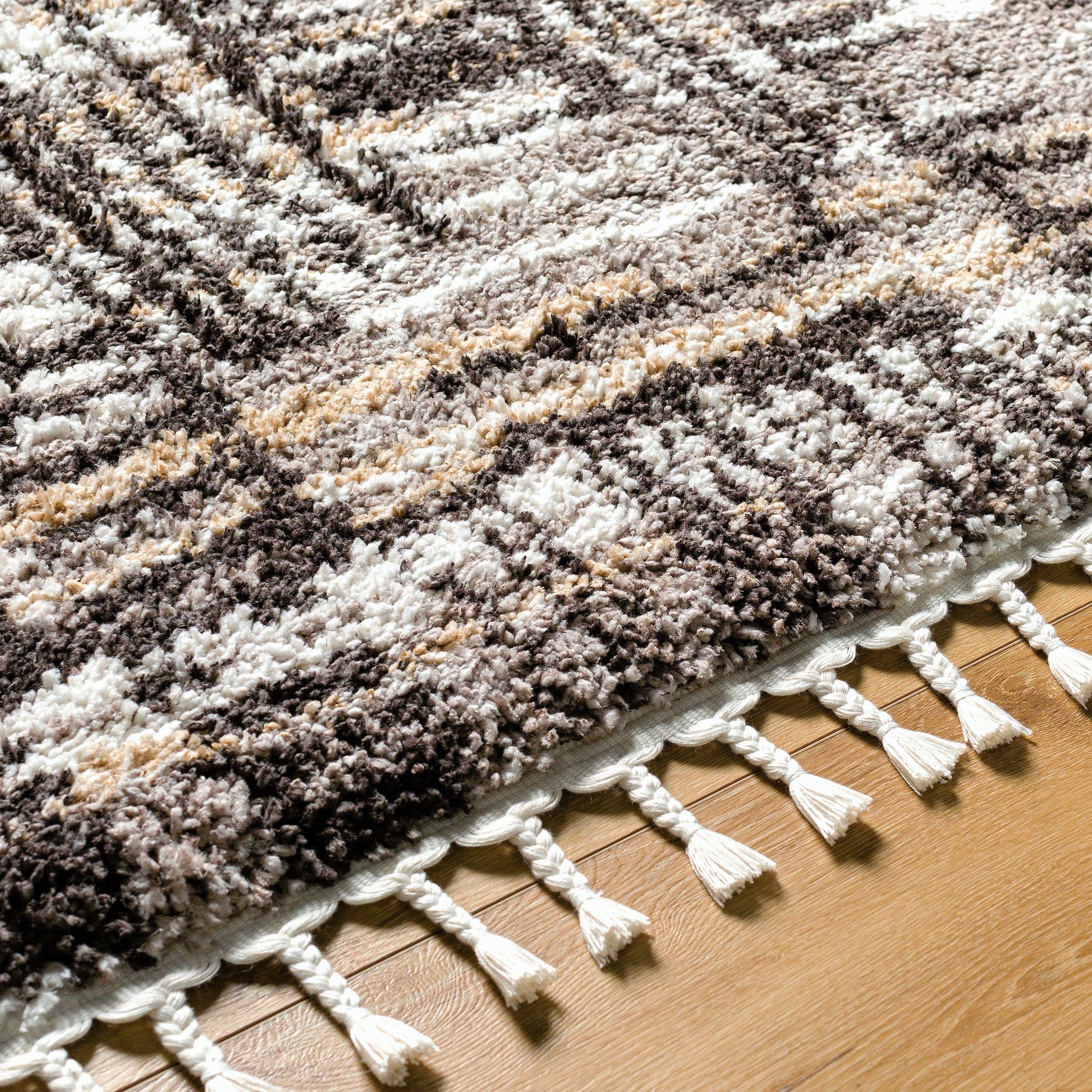 Jakarta Rug by Livabliss in gray, black. Made from main: 100% polyester in a modern style.