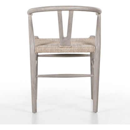 Muestra Dining Chair by Four Hands. Made from solid teak, 100% polyethylene in a coastal style.