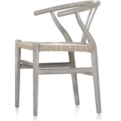 Muestra Dining Chair by Four Hands. Made from solid teak, 100% polyethylene in a coastal style.