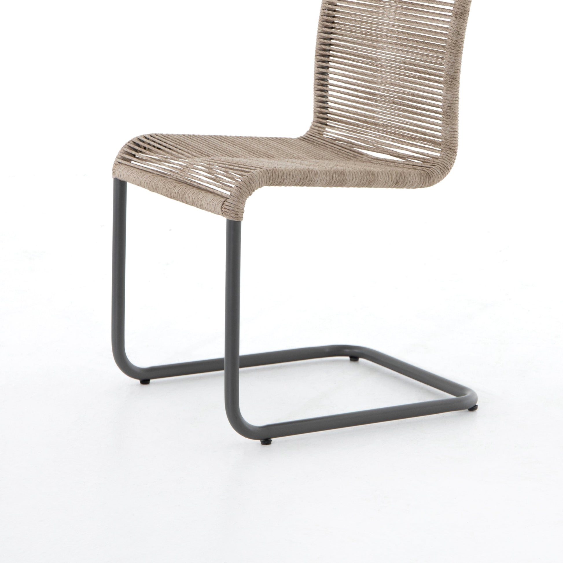 Grover Outdoor Dining Chair by Four Hands. Made from iron, 100% polyethylene in a coastal style.