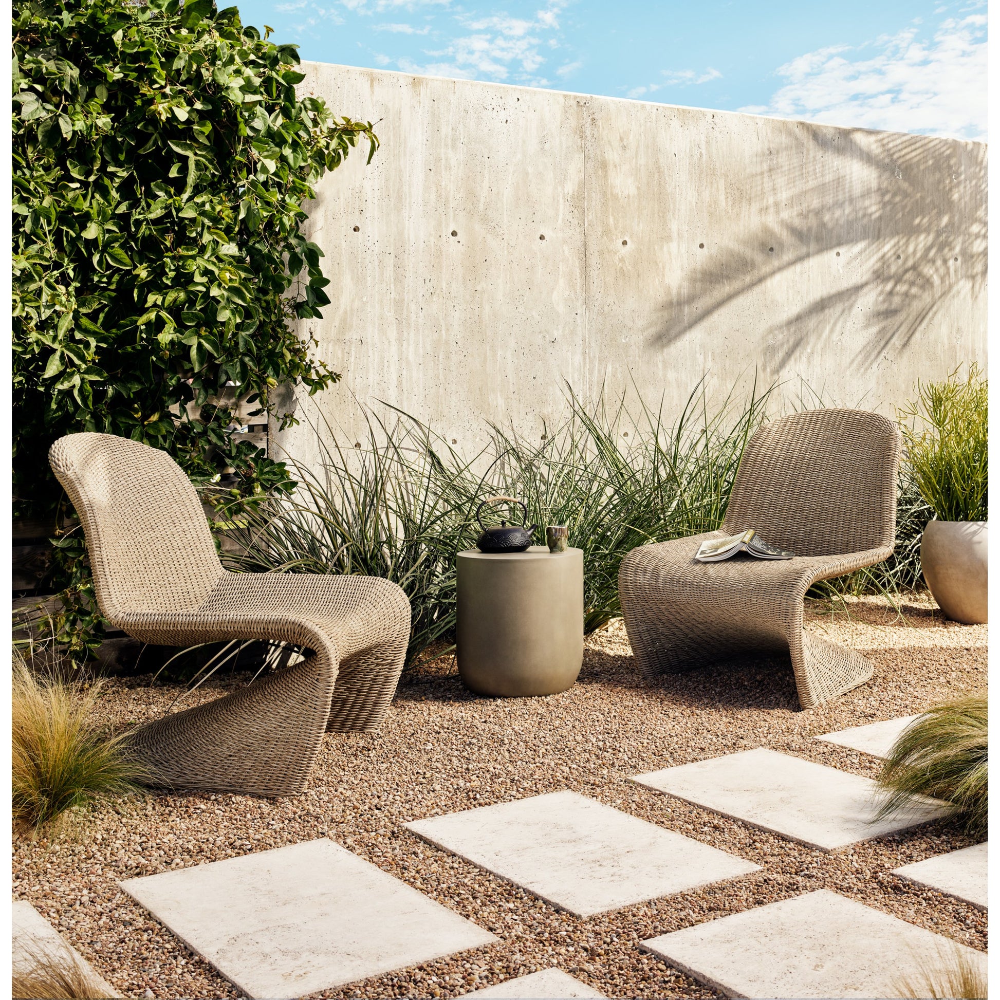 Portia Outdoor Occasional Chair by Four Hands. Made from 100% polyethylene, iron in a coastal style.