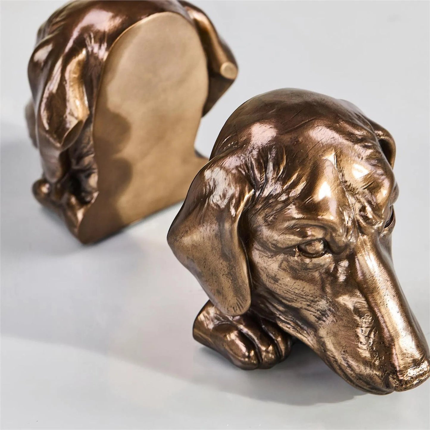 001 SI-2373152 | Additional Silo | Dachshund Bookends (Set of 2) by John-Richard in bronze and bronzed. Made from metal in a modern style.