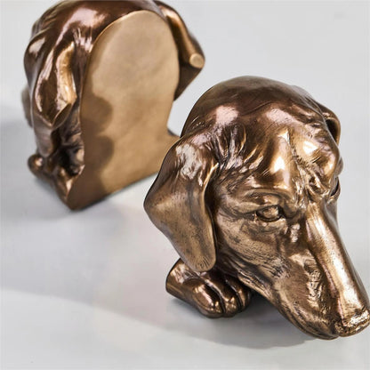 Dachshund Bookends (Set of 2) by John-Richard in bronze and bronzed. Made from metal in a modern style.