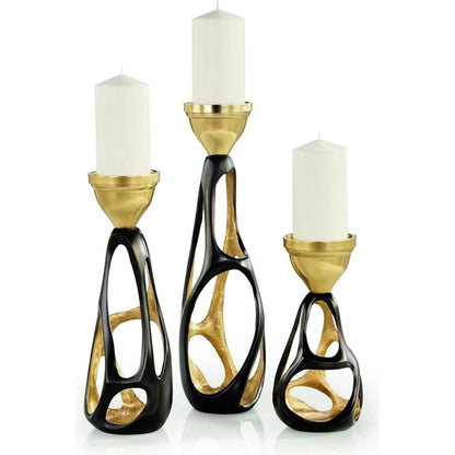 Nexus Candleholder by John-Richard in dark bronze, champagne. Made from unique in a eclectic & global style.