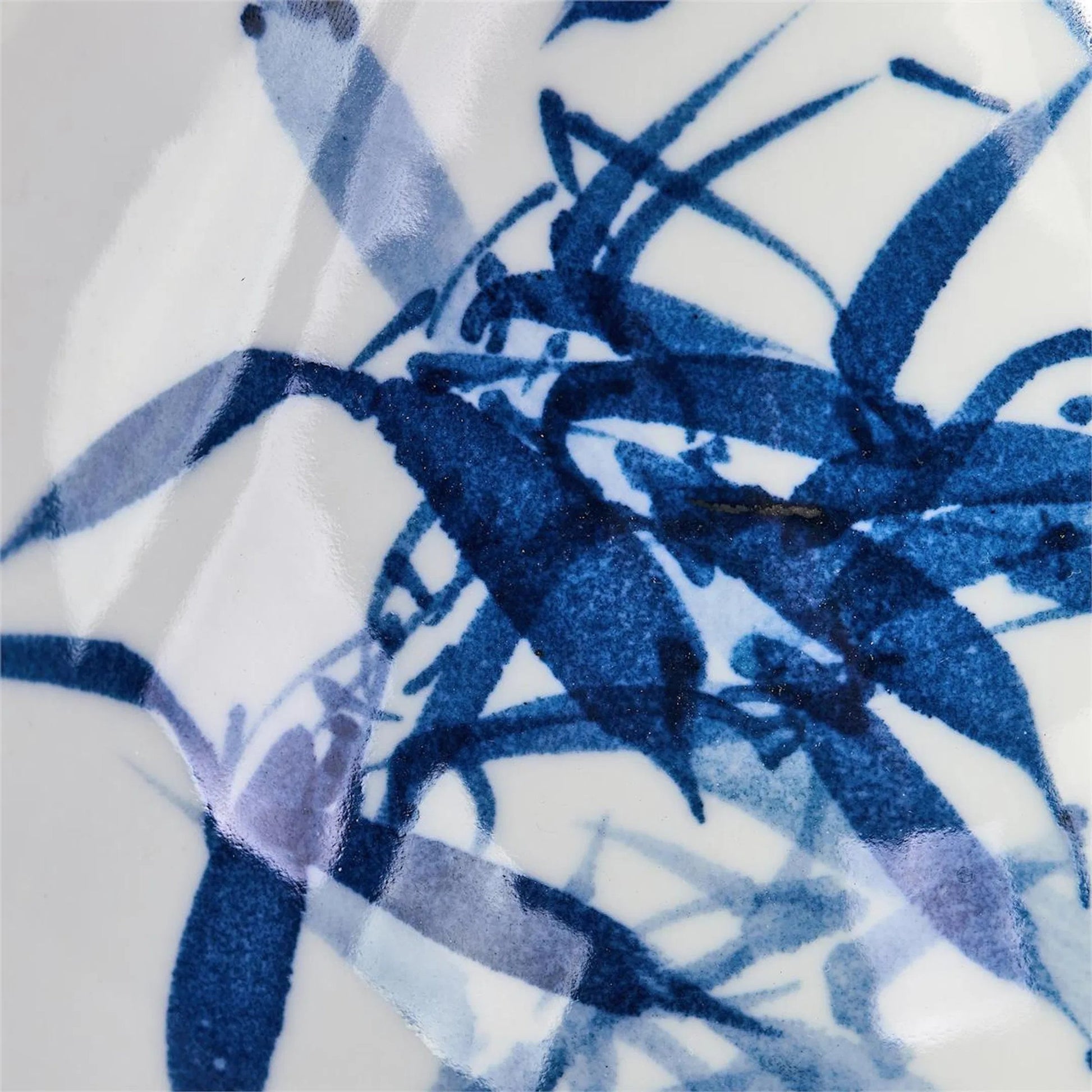 Coalescent Vase by John-Richard in white, dark blue, light blue and glazed. Made from porcelain in a traditional style.