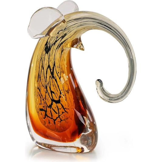 Abstract Glass Elephant Sculpture by John-Richard in clear, amber, black. Made from art glass in a unique style.