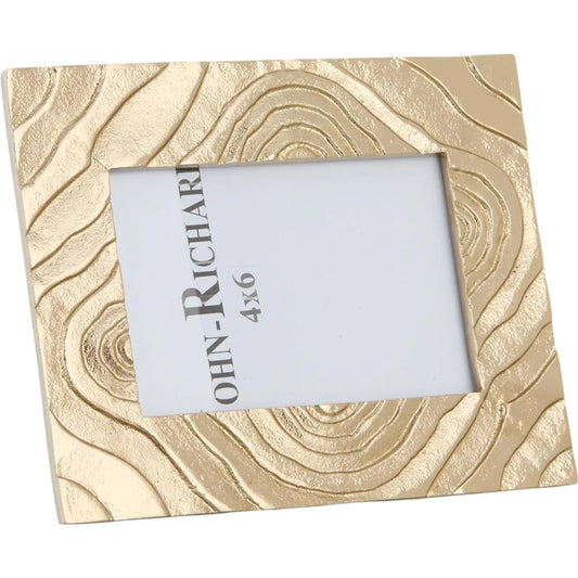 Hypnotic Photo Frame by John-Richard in gold. Made from unique in a unique style.