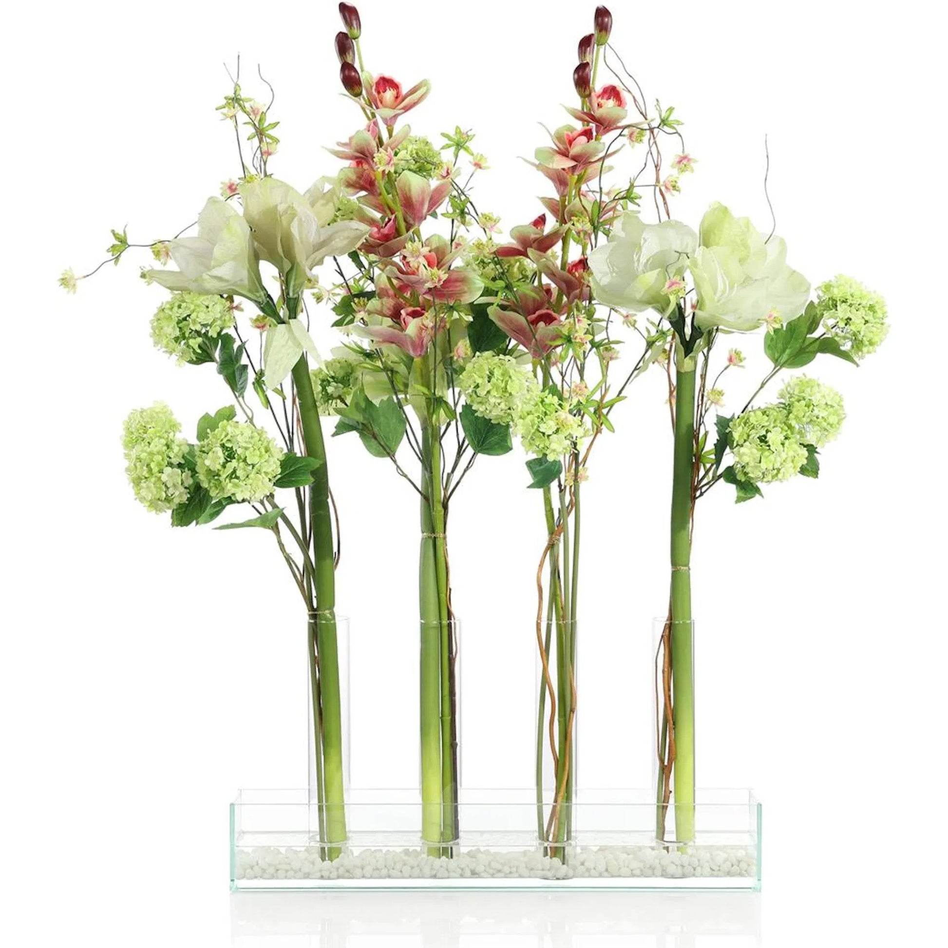 Changing Florals 1 by John-Richard in green, white, pink, gold. Made from snowballs, amaryllis, cymbidium orchids, natural curly willow, wildflowers, wire, faux water, glass in a transitional style.