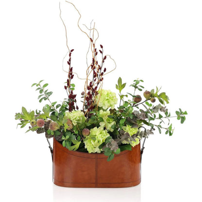 Classic Leather by John-Richard in green, brown. Made from flocked fig stems, silver dollar eucalyptus, pussy willows, curly willows, hydrangea bush, leather in a transitional style.