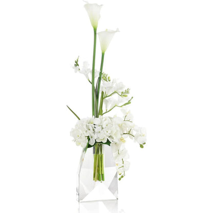 Crystal Snow Blooms by John-Richard in white, green, clear. Made from orchid, hydrangeas, freesias, calla lilies, glass in a transitional style.