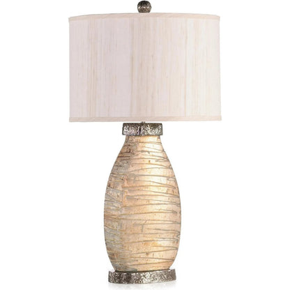 Coppertone Table Lamp by John-Richard in nickel, beige and antique mercury. Made from art glass, metal, fabric in a modern style.