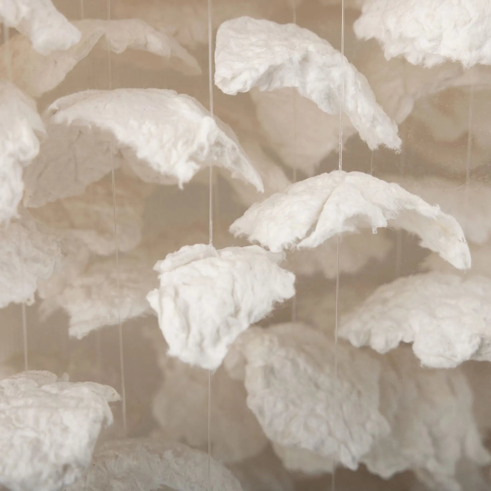 Ethereal Wreath by John-Richard in white, off-white. Made from paper, linen, thread, acrylic in a transitional style.