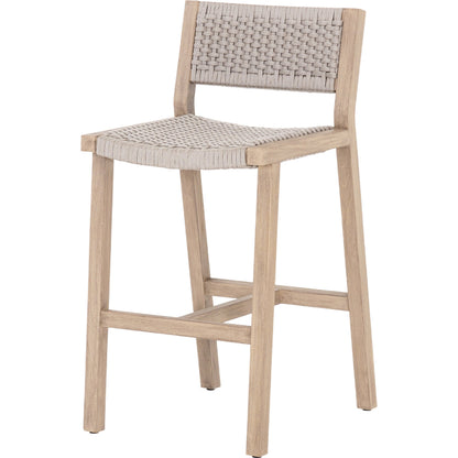 Delano Outdoor Bar Stool by Four Hands. Made from solid fsc®-certified teak, 100% polypropylene in a coastal style.