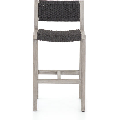 Delano Outdoor Bar Stool by Four Hands. Made from solid fsc®-certified teak, 100% polypropylene in a coastal style.