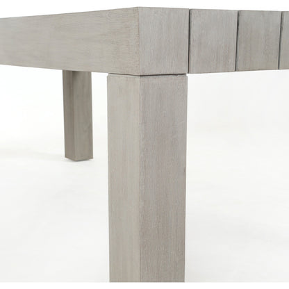 Sonora Outdoor Dining Table by Four Hands in weathered grey. Made from solid teak in a modern style.