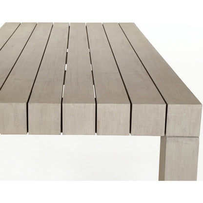 Sonora Outdoor Dining Table by Four Hands in weathered grey. Made from solid teak in a modern style.