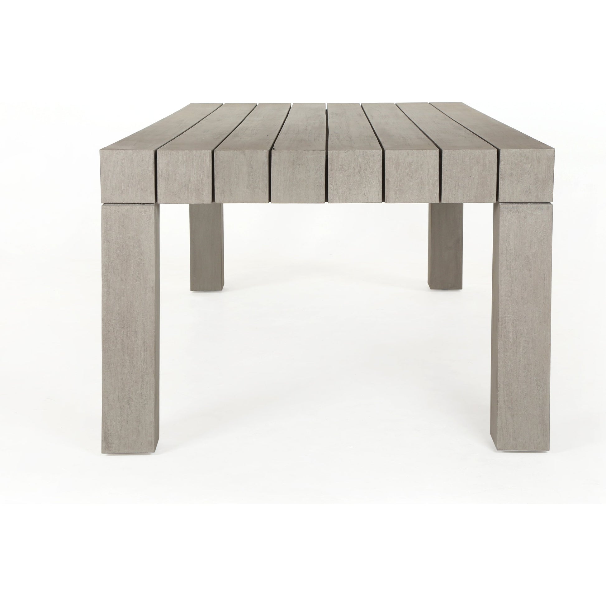 Sonora Outdoor Dining Table by Four Hands in weathered grey. Made from solid teak in a modern style.
