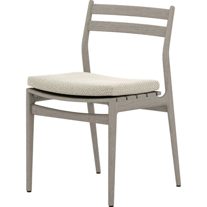 Atherton Outdoor Dining Chair by Four Hands. Made from 100% olefin, solid fsc®-certified teak, 91% polyurethane foam pad, 9% polyester fiber batting in a coastal style.