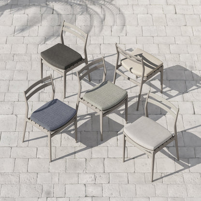 Atherton Outdoor Dining Chair by Four Hands. Made from 100% olefin, solid fsc®-certified teak, 91% polyurethane foam pad, 9% polyester fiber batting in a coastal style.