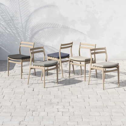 Atherton Outdoor Dining Chair by Four Hands. Made from 100% olefin, solid fsc®-certified teak, 91% polyurethane foam pad, 9% polyester fiber batting in a coastal style.