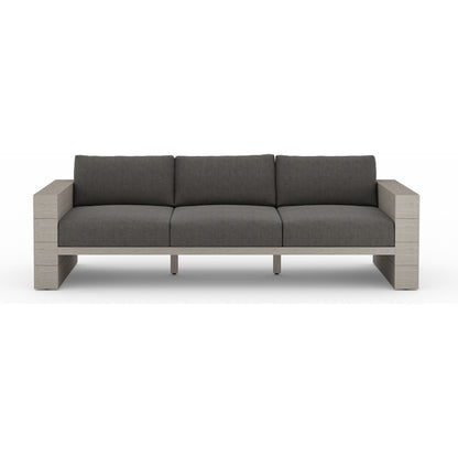 Leroy Outdoor Sofa by Four Hands. Made from 100% olefin, solid teak, 91% polyurethane foam pad, 9% polyester fiber batting in a coastal style.