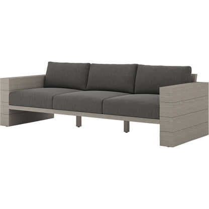 Leroy Outdoor Sofa by Four Hands. Made from 100% olefin, solid teak, 91% polyurethane foam pad, 9% polyester fiber batting in a coastal style.