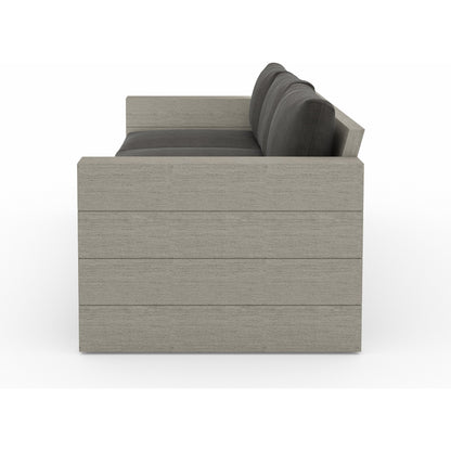Leroy Outdoor Sofa by Four Hands. Made from 100% olefin, solid teak, 91% polyurethane foam pad, 9% polyester fiber batting in a coastal style.