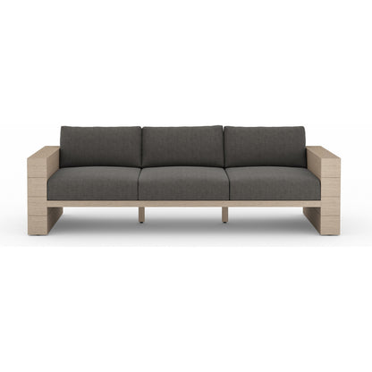 Leroy Outdoor Sofa by Four Hands. Made from 100% olefin, solid teak, 91% polyurethane foam pad, 9% polyester fiber batting in a coastal style.