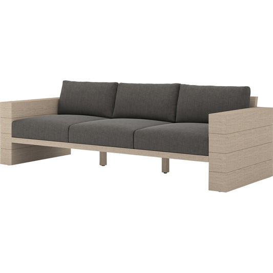 Leroy Outdoor Sofa by Four Hands. Made from 100% olefin, solid teak, 91% polyurethane foam pad, 9% polyester fiber batting in a coastal style.