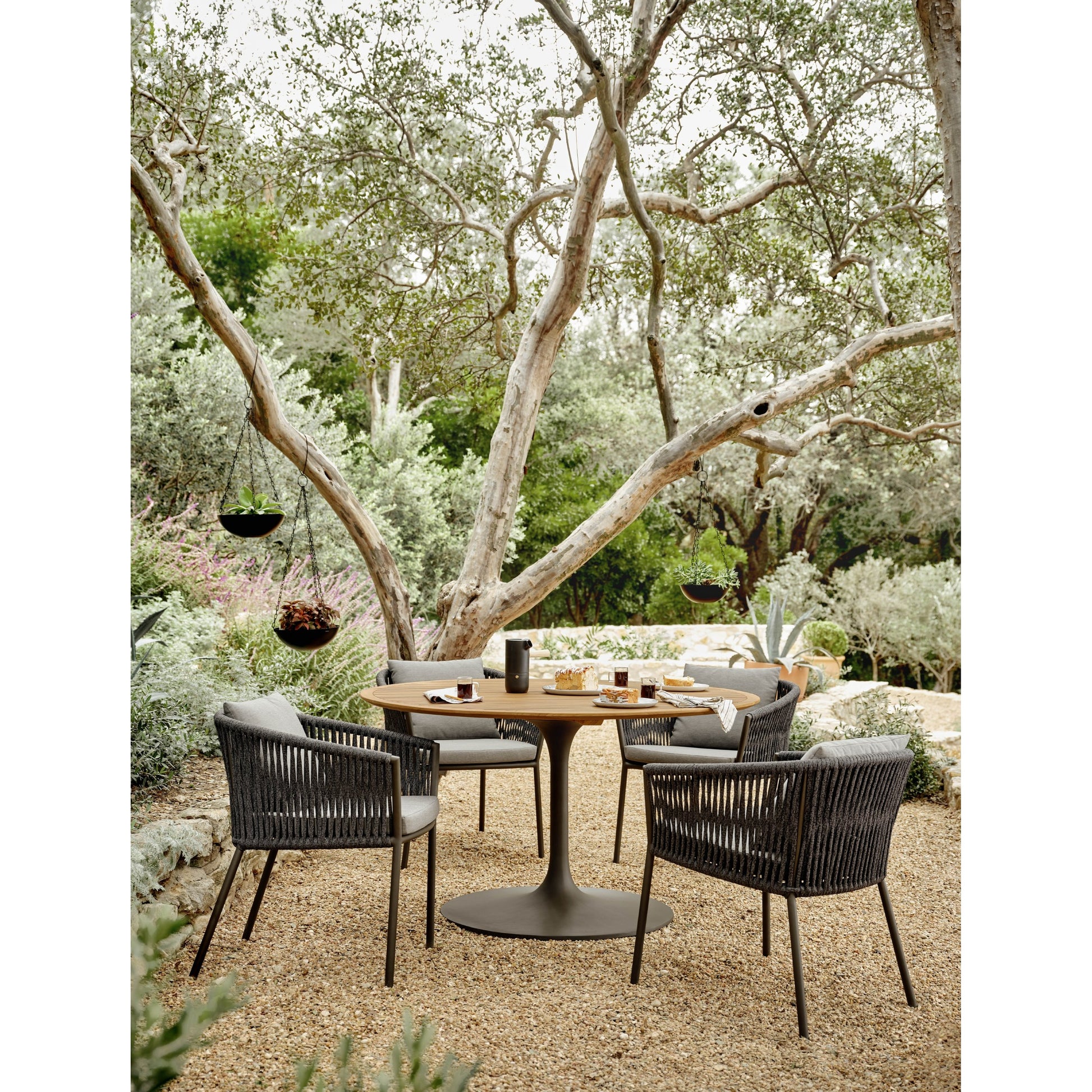 Porto Outdoor Dining Chair by Four Hands. Made from 100% olefin, aluminum, 100% polypropylene in a modern style.