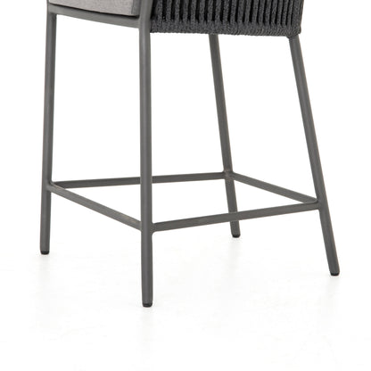 Porto Outdoor Counter Stool by Four Hands in charcoal. Made from 100% olefin, aluminum, 100% polypropylene in a modern style.