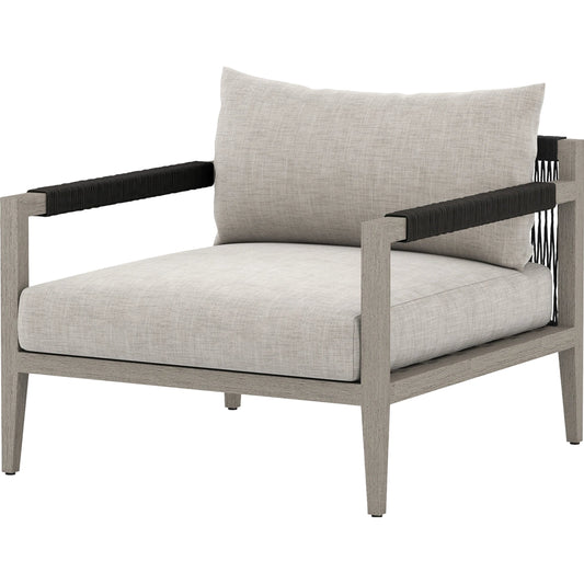 Sherwood Outdoor Chair, Weathered Grey by Four Hands. Made from 100% olefin, solid fsc®-certified teak, 100% polypropylene in a coastal style.