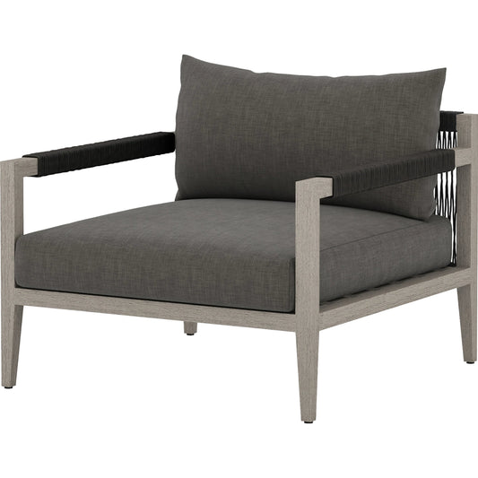 Sherwood Outdoor Chair, Weathered Grey by Four Hands. Made from 100% olefin, solid fsc®-certified teak, 100% polypropylene in a coastal style.