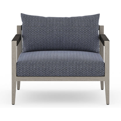 Sherwood Outdoor Chair, Weathered Grey by Four Hands. Made from 100% olefin, solid fsc®-certified teak, 100% polypropylene in a coastal style.