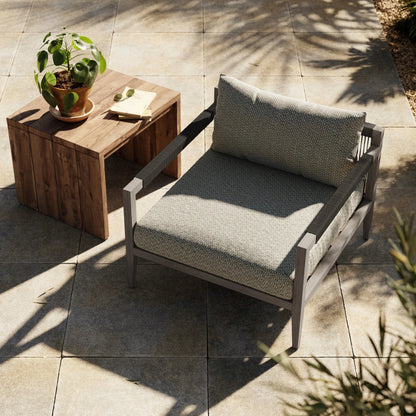 Sherwood Outdoor Chair, Weathered Grey by Four Hands. Made from 100% olefin, solid fsc®-certified teak, 100% polypropylene in a coastal style.