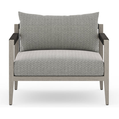 Sherwood Outdoor Chair, Weathered Grey by Four Hands. Made from 100% olefin, solid fsc®-certified teak, 100% polypropylene in a coastal style.
