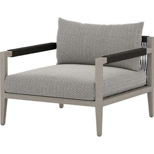 Sherwood Outdoor Chair, Weathered Grey by Four Hands. Made from 100% olefin, solid fsc®-certified teak, 100% polypropylene in a coastal style.