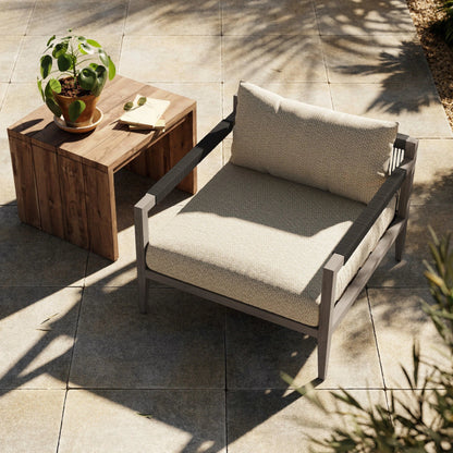 Sherwood Outdoor Chair, Weathered Grey by Four Hands. Made from 100% olefin, solid fsc®-certified teak, 100% polypropylene in a coastal style.
