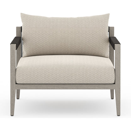 Sherwood Outdoor Chair, Weathered Grey by Four Hands. Made from 100% olefin, solid fsc®-certified teak, 100% polypropylene in a coastal style.