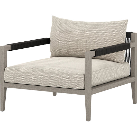Sherwood Outdoor Chair, Weathered Grey by Four Hands. Made from 100% olefin, solid fsc®-certified teak, 100% polypropylene in a coastal style.
